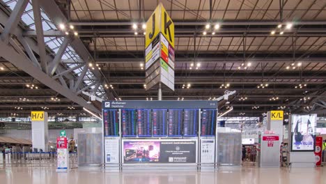 timelapse-view-inside-departure-terminal-with-many-passenger-while-checking-information-check-in-board