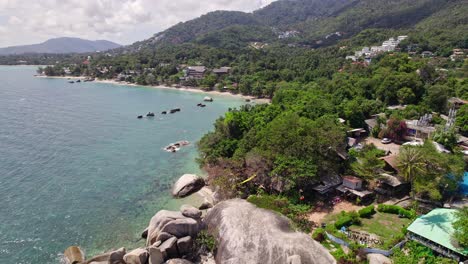 Beautiful-4K-drone-footage-of-the-beach-and-unique-rock-features-at-Hin-Ta-Hin-Yai-Beach-on-Koh-Samui-in-Thailand