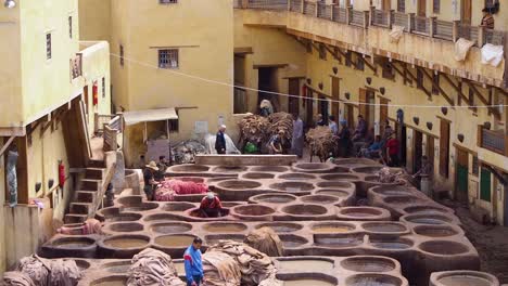4K-Footage-of-man-working-in-Chouwara-Tannery-in-the-old-medina-of-Fez