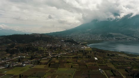 Aerial-View-Of-Cultivated-Lands-At-The-Bottom-Of-Imbabura-Volcano-At-San-Pablo-Lagoon-In-Otavalo,-Ecuador