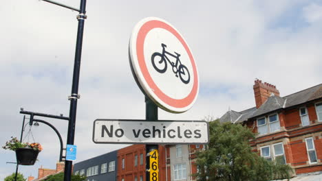 No-vehicles-sign-and-no-bicycles-on-a-road-in-a-British-town