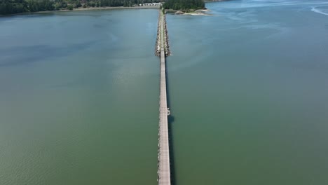 Top-down-aerial-shot-of-the-bicycle-bridge-across-Fidalgo-Bay