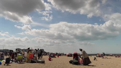 Multi-Ethnic-Families-On-Beach-At-Margate-With-Birds-Flying-Overhead