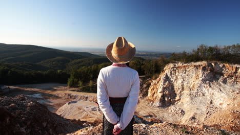 Romanian-woman-walks-on-the-mountain-and-admires-the-stone-quarry-2