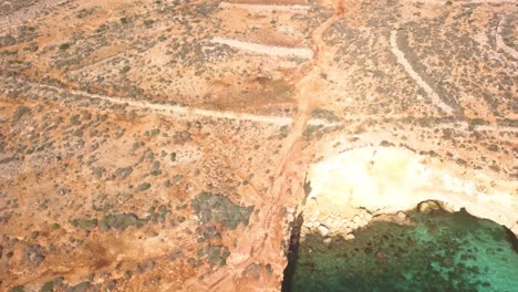 Aerial-view-of-Blue-Lagoon-and-the-dry-desolate-surrounding-landscape