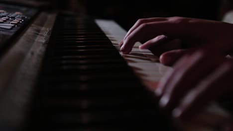 Fingers-playing-on-a-keyboard