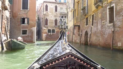 Venice,-Italy-Gondola-POV-3-Between-Buildings