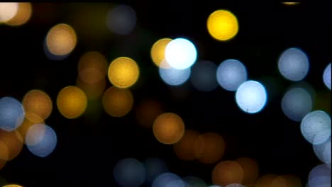 blue-and-orange-light-spots-in-the-night-and-not-in-focus