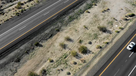 birds-eye-view-flying-over-two-lane-interstate-10-in-Arizona-near-the-California-state-line