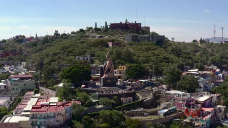 AERIAL:-Guanajuato-City-and-The-Pipila,-Mexico