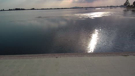 Water-pollution-with-the-sun-reflection-in-the-grey-water
