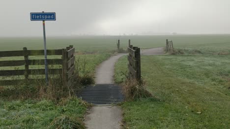 Cycle-path-in-the-countryside-in-the-morning-The-Netherlands-Friesland,-Holland