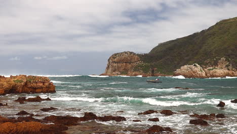 A-commercial-passenger-vessel-slowly-investigates-the-Knysna-Heads-before-turning-back-because-of-the-danger