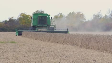 A-John-Deere-9600-Maximizer-Combine-harvesting-soybeans-in-a-farm