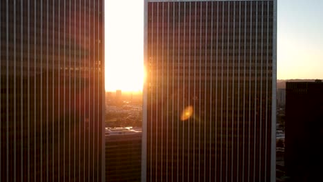 Tall-buildings-during-golden-hour-in-Los-Angeles---pan-right-to-left