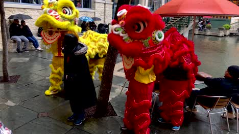 Chinese-Dragons-pose-with-guests-at-the-Rivercenter-Mall-for-the-Concucius-Lantern-Festival-4K30fps-Slow-Motion