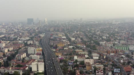 Aerial-wide-drone-shot-of-a-very-polluted-day-in-Mexico-City
