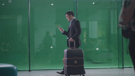 Green-Screen-of-Business-Man-Using-His-Phone-While-Walking-4K