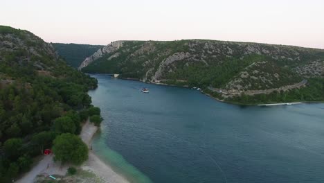 Slow-moving-aerial-shot-of-the-river-in-Skradin-in-Šibenik-Knin-County-Croatia