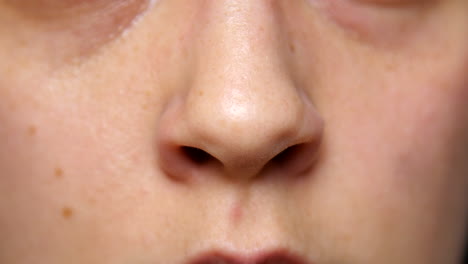 Person-flares-their-nostrils