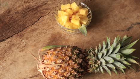 pineapple-on-the-wood-texture-background