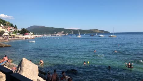 People-enjoying-in-sea-in-Herceg-Novi,-Montenegro