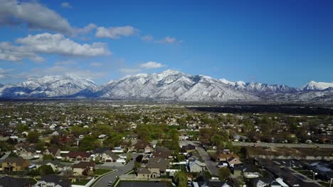 Drone-Shot-above-the-Salt-Lake-Valley-with-the-Wasatch-Mountain-Range-in-the-background