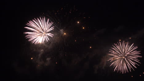 Firework-display-at-night-on-sky-background