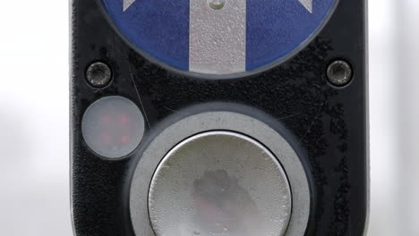 Pedestrian-crossing-button-at-a-traffic-intersection