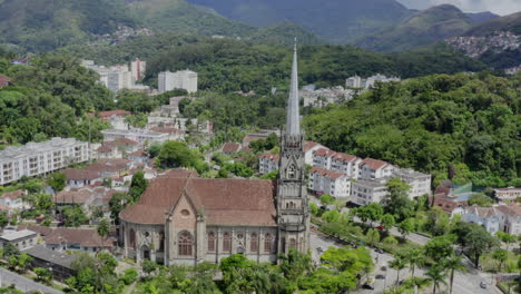 Aerial-circle-l-shot-of-Petropolis-Cathedral-and-city,-Brazil