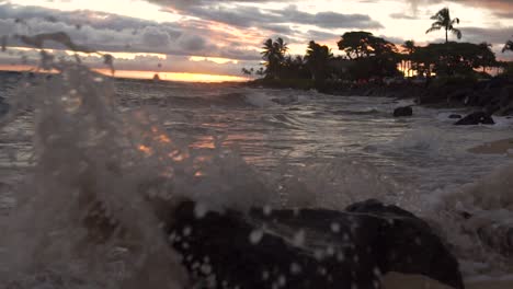 Slow-motion-pan-along-beach-on-Hawaii-at-sunset