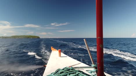 Rear-passenger-view-on-travel-boat-leaving-island