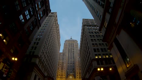 pov-driving-city-streets-Chicago-board-of-trade-building-fpv-4k