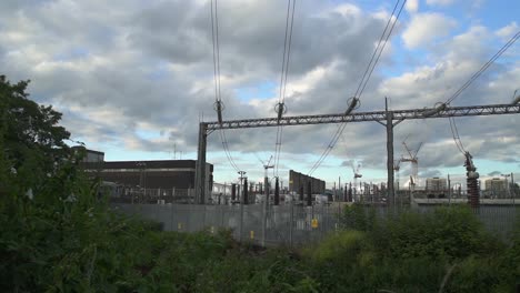 Pan-right-on-a-power-station-with-power-lines-and-electricity-cables