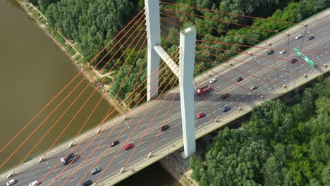 Modern-cable-stayed-bridge-and-car-traffic-on-background