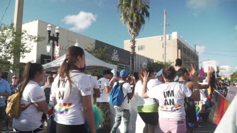 People-Marching-in-Street-With-Ally-Shirts-at-River-City-Pride-Parade-in-Jacksonville,-FL