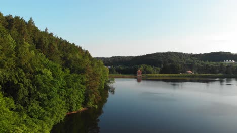 Łapino-lake-in-pomeranian-district-dolly-shot-from-a-drone