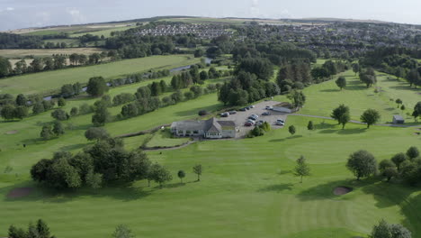 An-aerial-view-of-Turriff-Golf-Club,-Aberdeenshire,-on-a-sunny-morning
