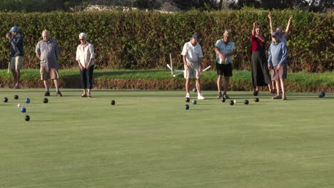 A-group-of-lawn-bowlers-playing-a-casual-game-in-the-evening