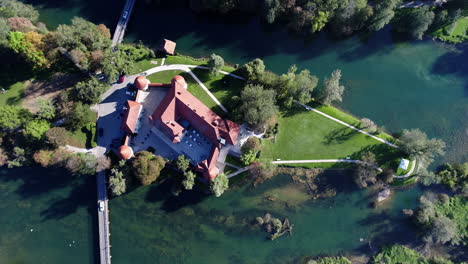 Aerial-Top-Down-View-Of-The-Incredible-Otocec-Castle