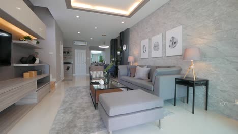 Komplett-Eingerichtetes-Wohnzimmer-Mit-Stilvollen-Möbeln-Und-Beleuchtung