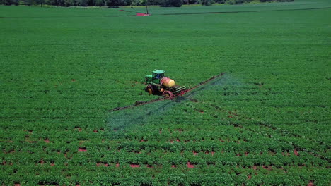 Drone-picture-of-a-beautiful-crop-being-sprayed