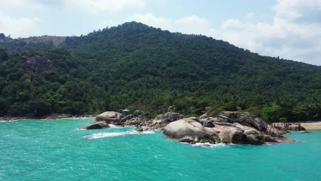 tropical-sandy-beach-rocky-coast-Koh-Phangan