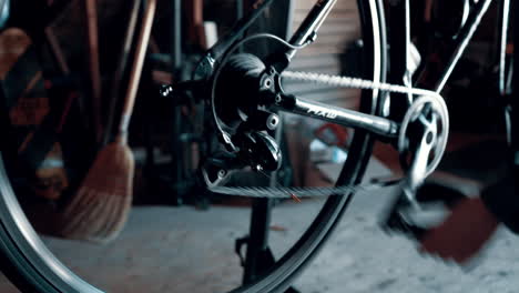 Bicycle-mechanic-changing-gears-on-a-Raleigh-road-bicycle