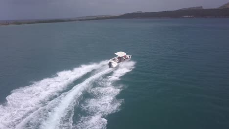 Boat-speeding-on-water-turning-a-corner