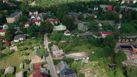 Aerial-view-dolly-in-of-Smiltene-town,-establishing-shot,-Latvia