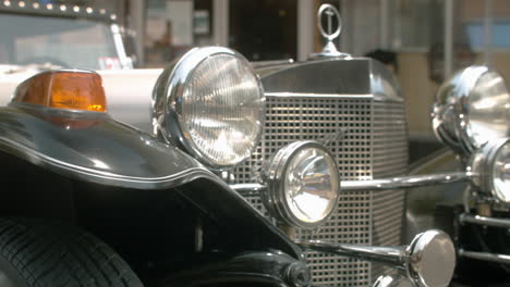 Headlight-and-fender-on-classic-Excalibur-automobile,-Slide-Left