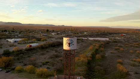 Flying-Close-By-The-Old-Water-Tower-Of-Amado,-Arizona,-USA-At-Dusk