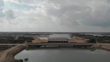 Aerial-Over-Bridge-And-Barrage-Gate-In-Sindh-Pakistan-With-Clouds-Overhead