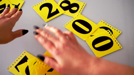 Yellow-flip-calendar-changes-to-a-new-year-hand